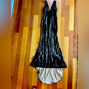 Black sequin gown from SHEIN. Tight. Longer train in back. So sexy